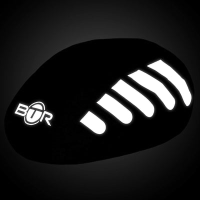 black bike helmet cover with reflective stripes night time shot
