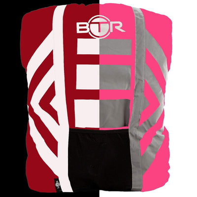 Pink hi vis waterproof backpack cover with reflective tape day and night half and half image