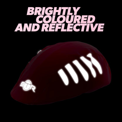 BTR pink bike helmet cover glowing in the dark with reflective strips