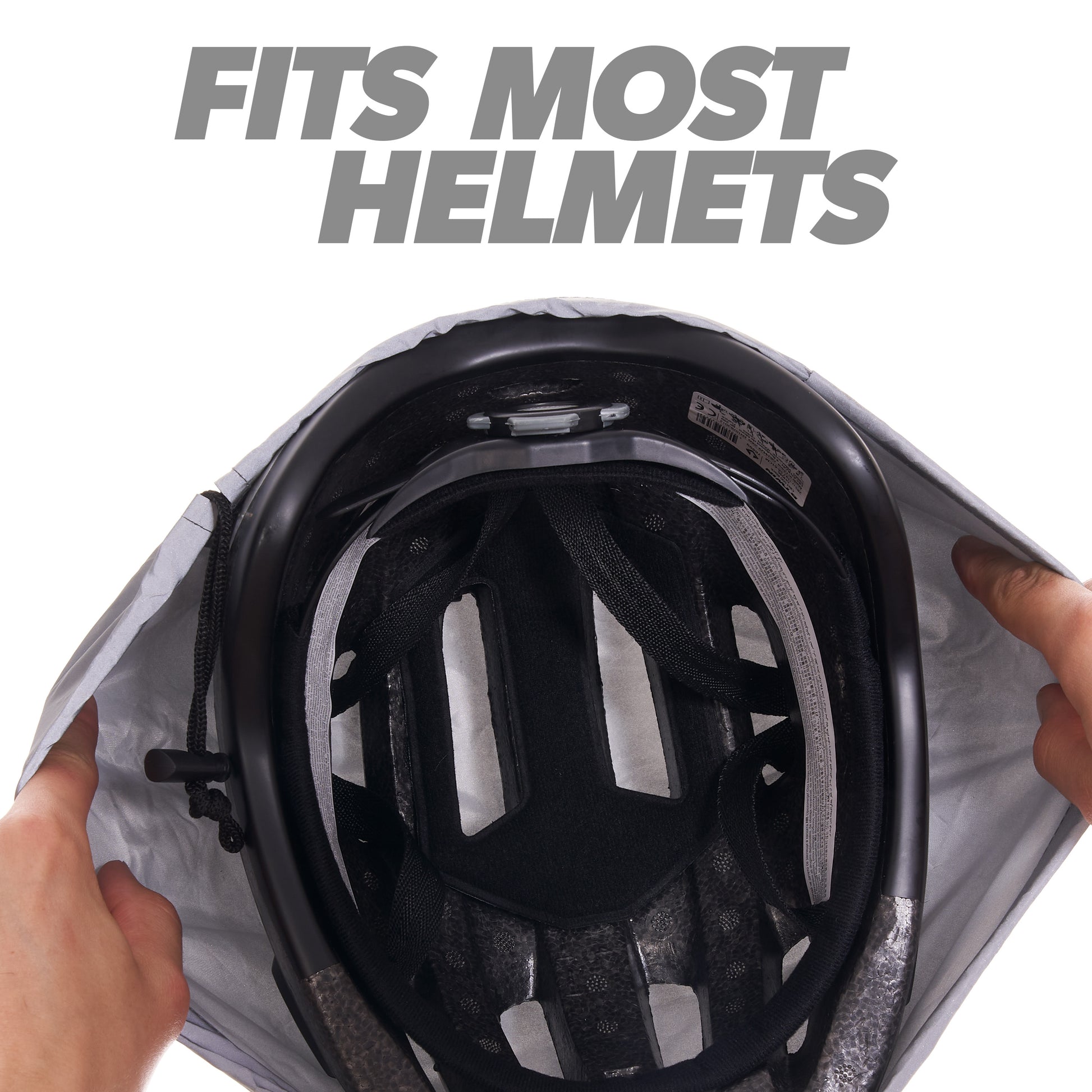 BTR silver helmet cover stretched over a bike helmet, fits most helmets