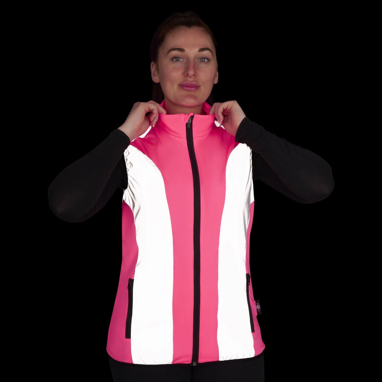 BTR womens pink hi vis gilet worn at night with reflective panels